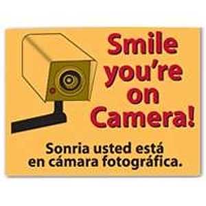 SIGN SMILE YOU'RE ON CAMERA   